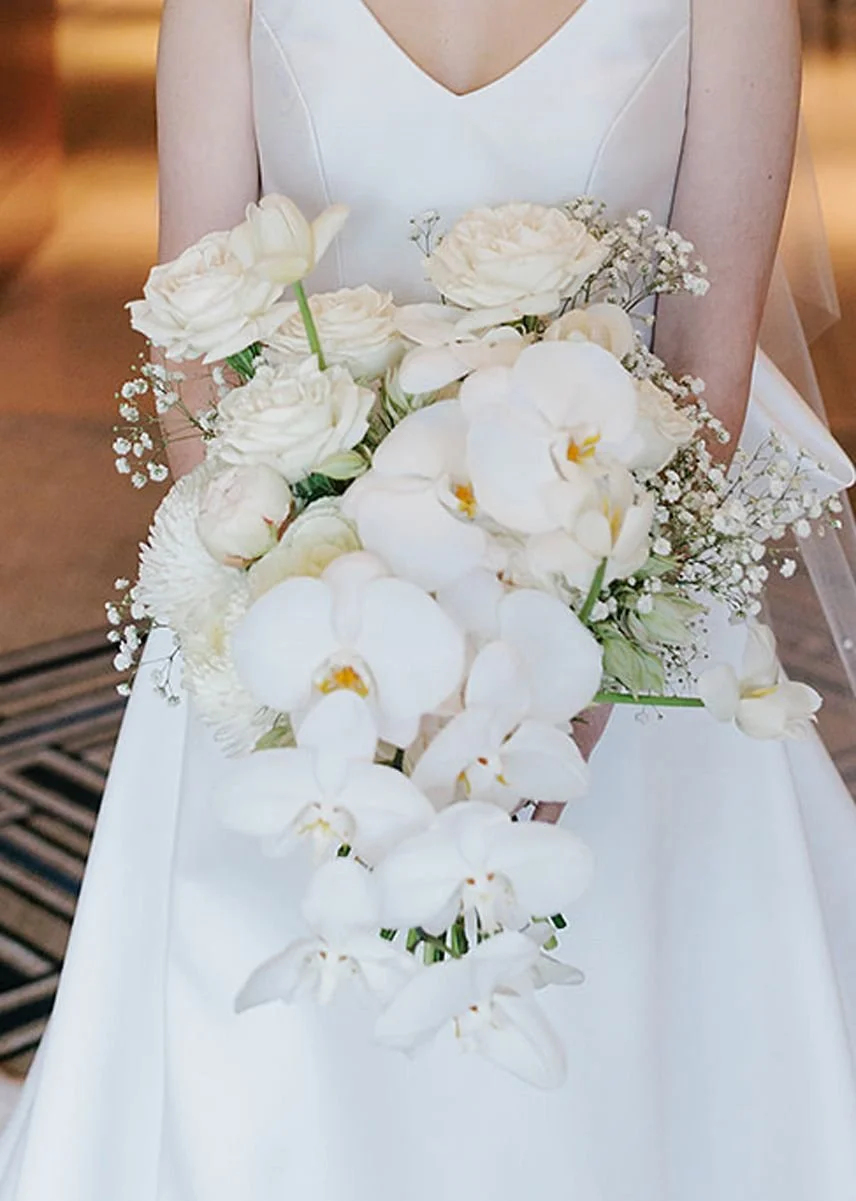 cascading-white-bridal-bouquet-orchids.jpg