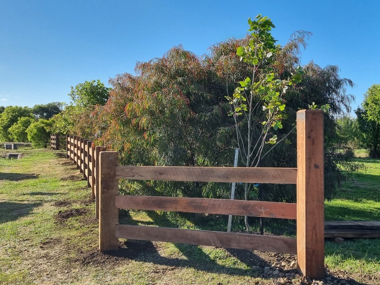 One of the beautiful things about post and rail fencing is how it can be installed around a curve, or up a hill. This job was no exception, and during installation one of our guys was caught commenting on the 'dead-straight curves'! We know what he m