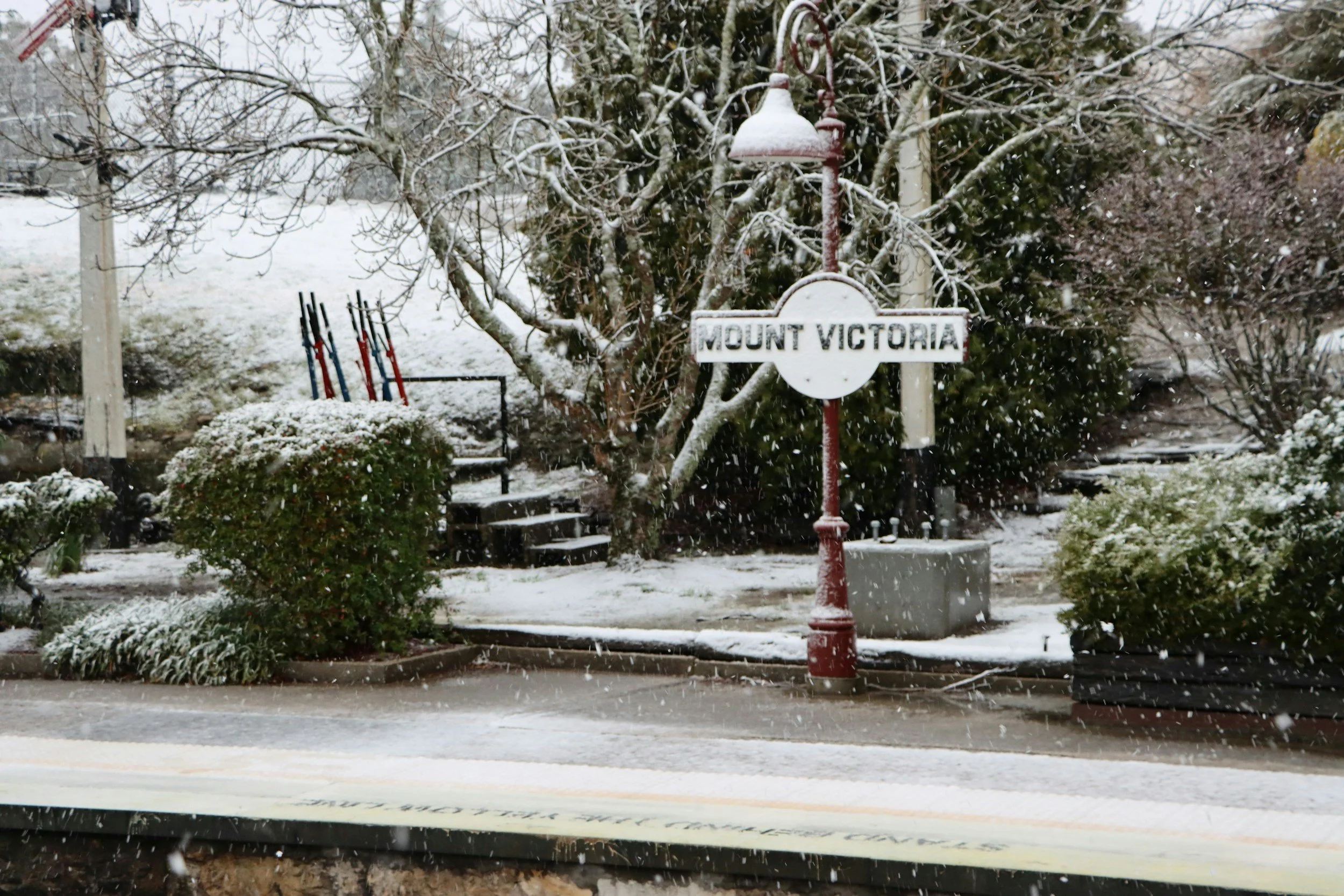 Railway platform with a dusting of snow from a recent shower at Mount Victoria