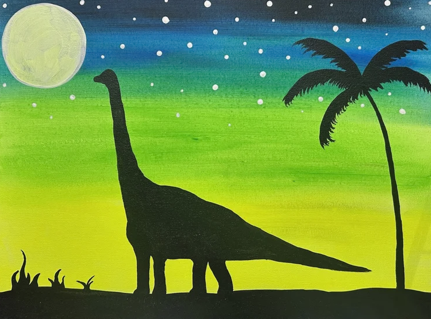 Silhouette of a giraffe, a palm tree, and some grass under a starry night sky with a full moon.