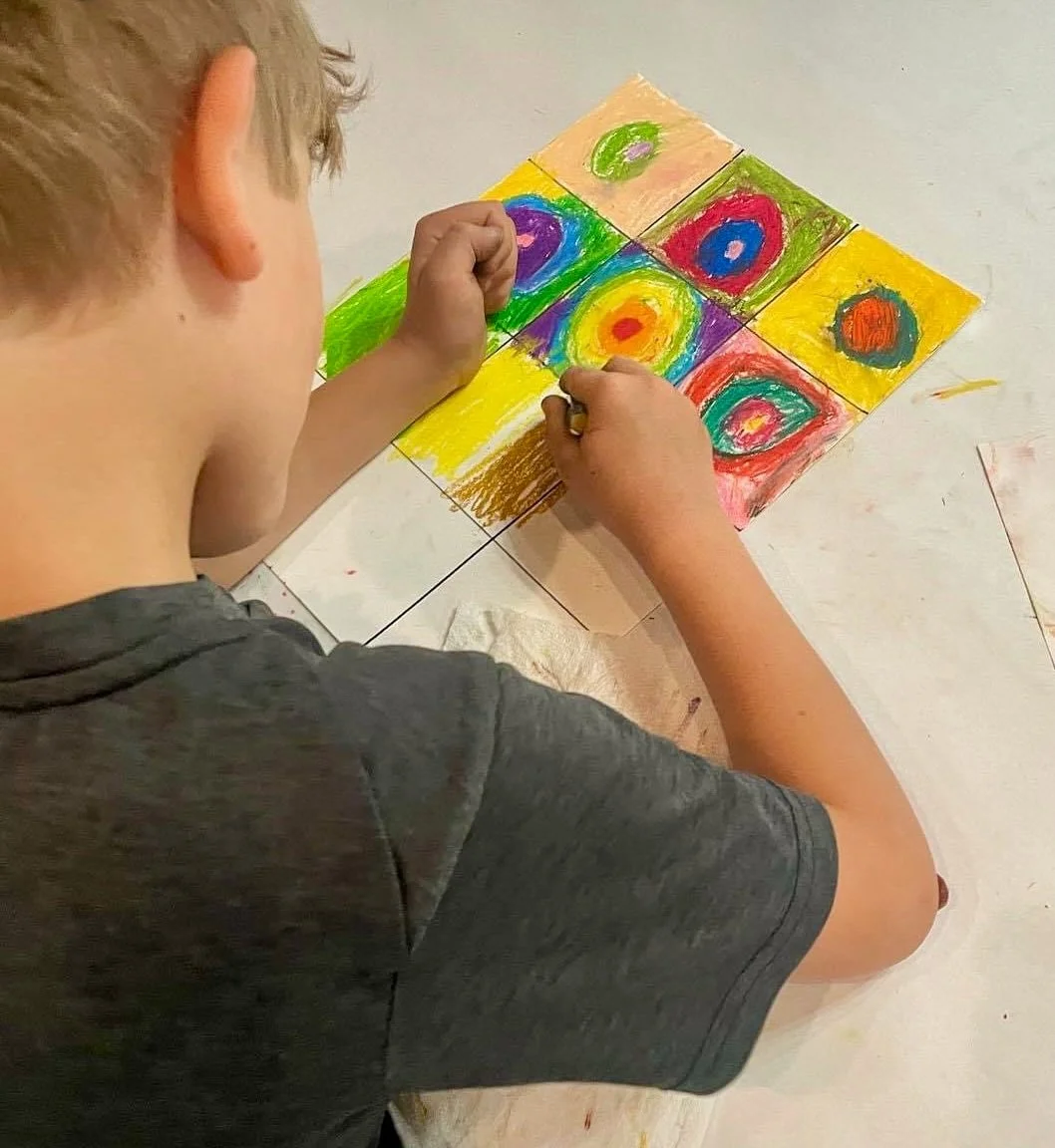 Child creating colorful artwork during a kids art class at Inspiration Haven Art Studio in Heber City, Utah.