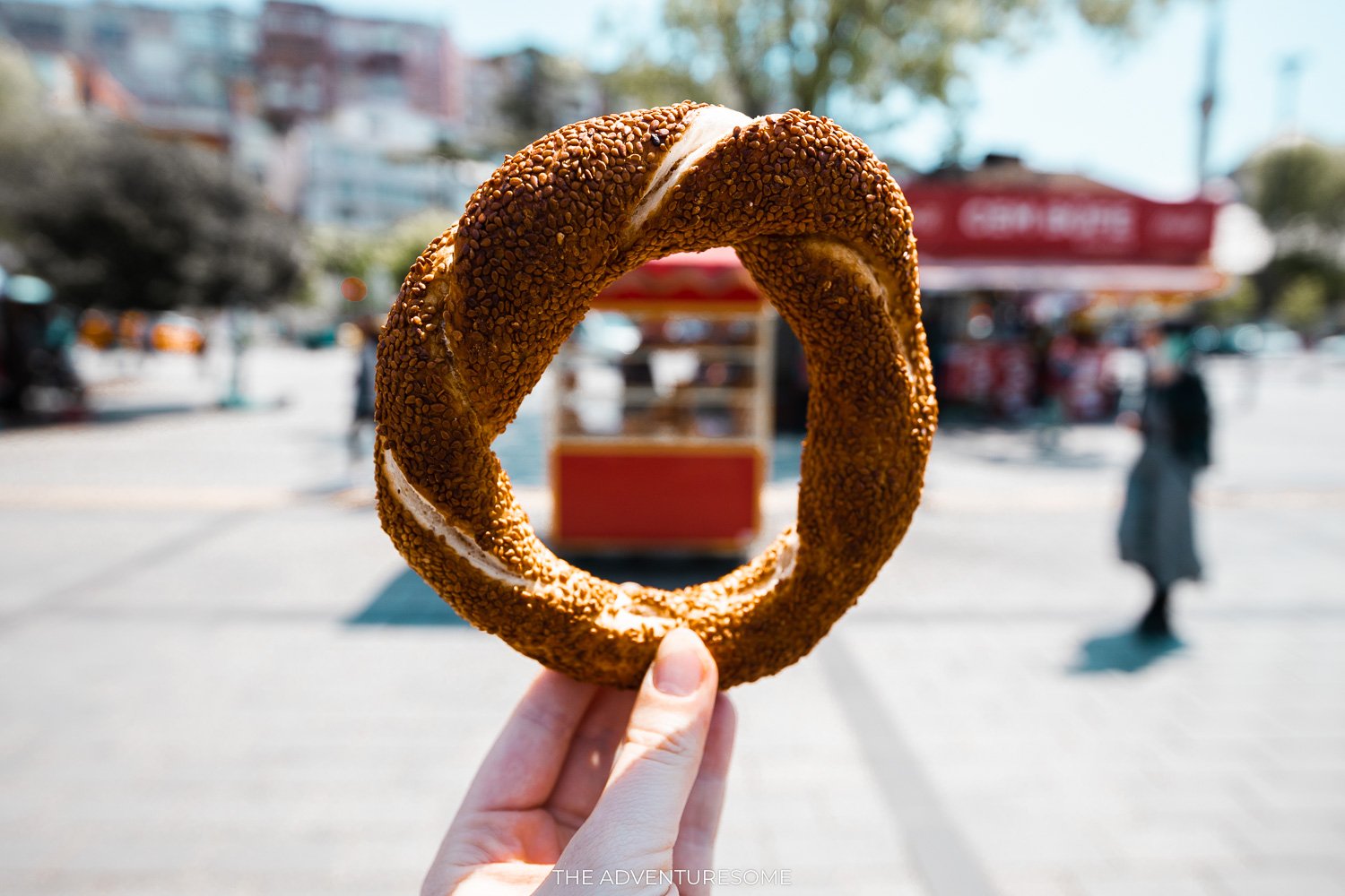 simit in front of vendor stall selling simit in istanbul