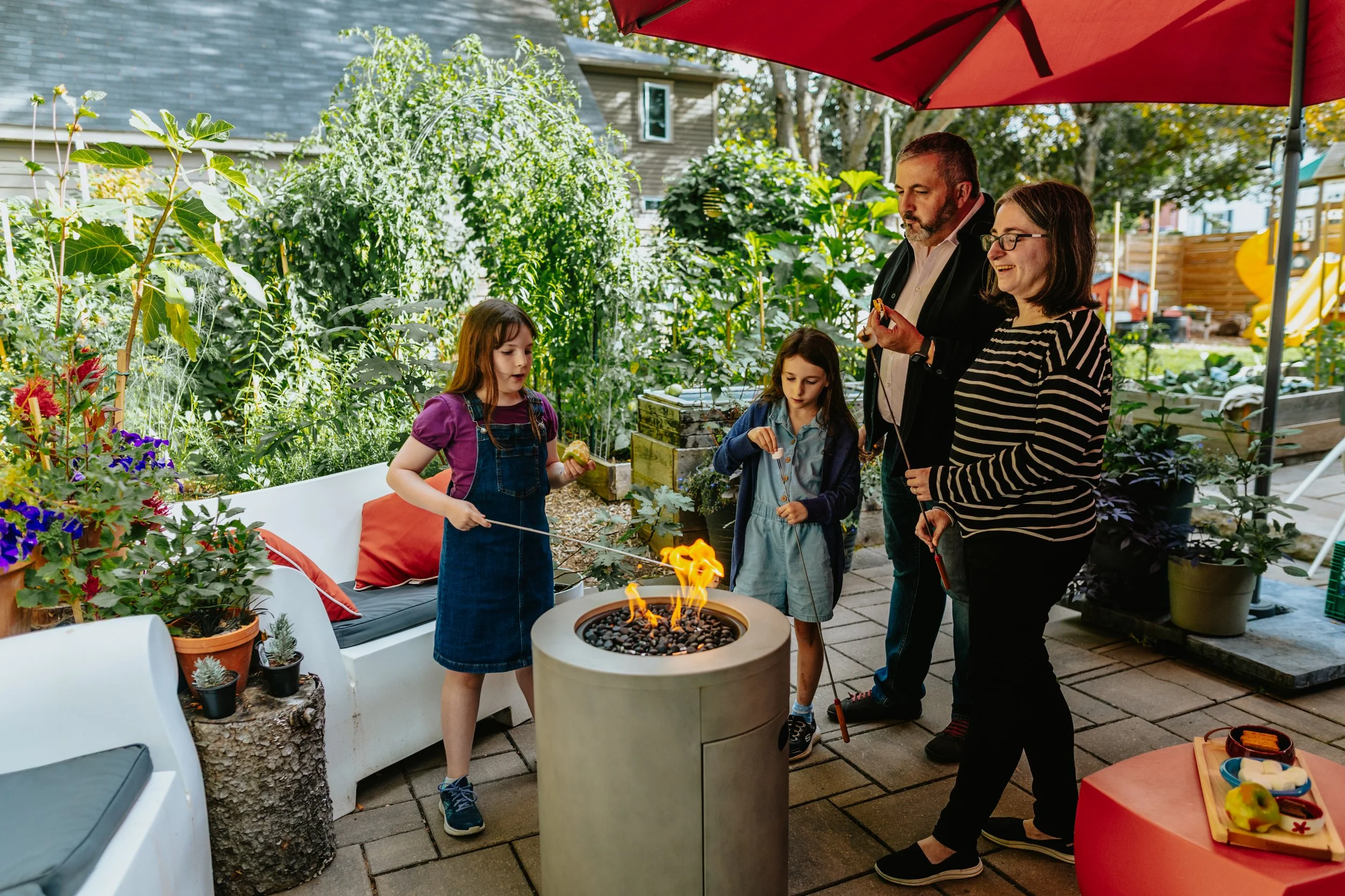 Lifestyle family photos Fredericton New Brunswick, backyard campfire session at home
