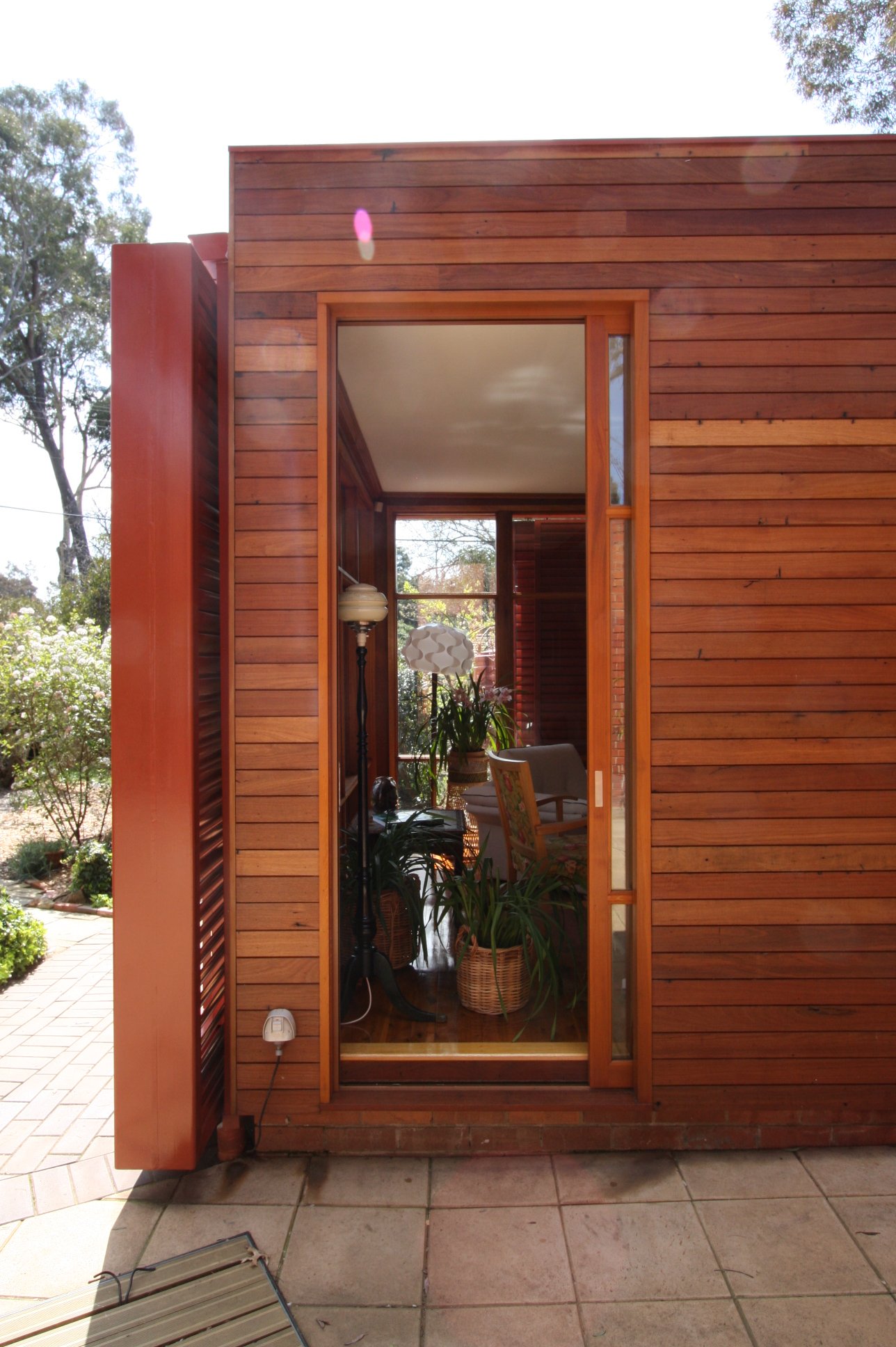 New Cavity Cedar External access door. From the Crtyd it appears to be a window
