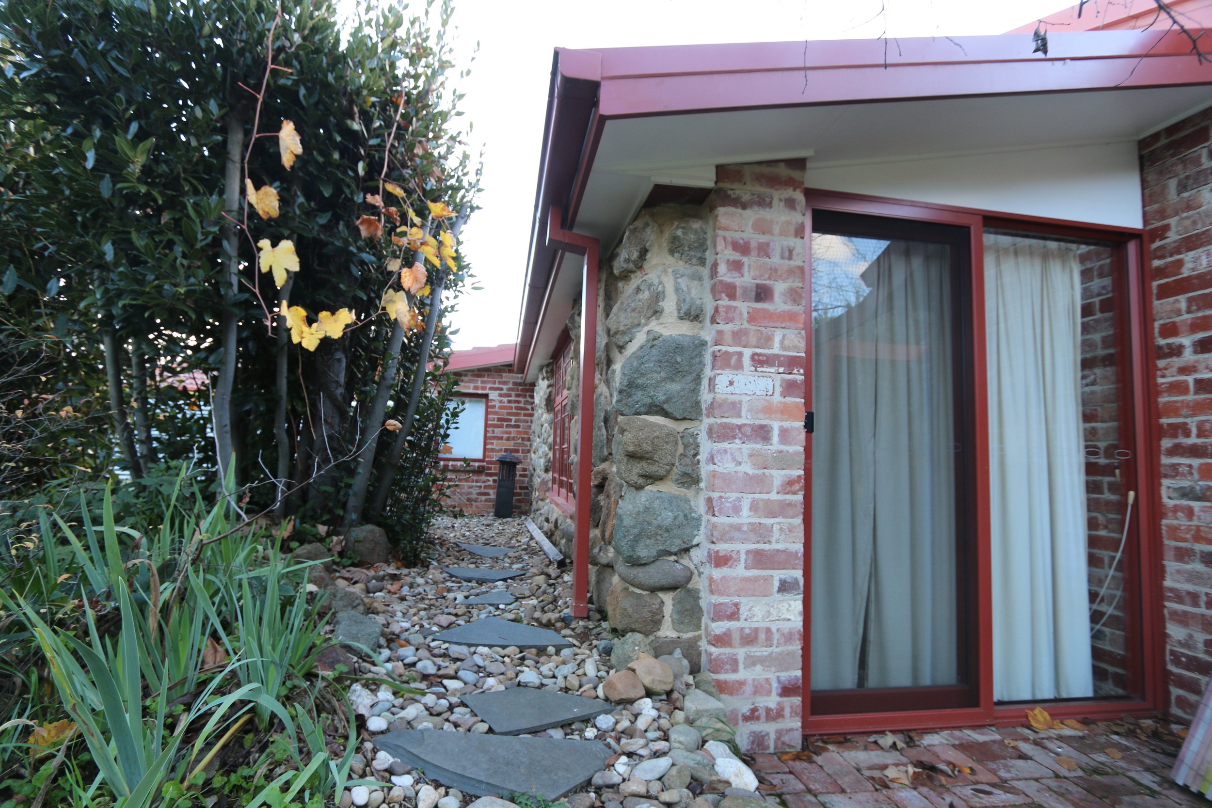Enclosing the space using existing rock wall