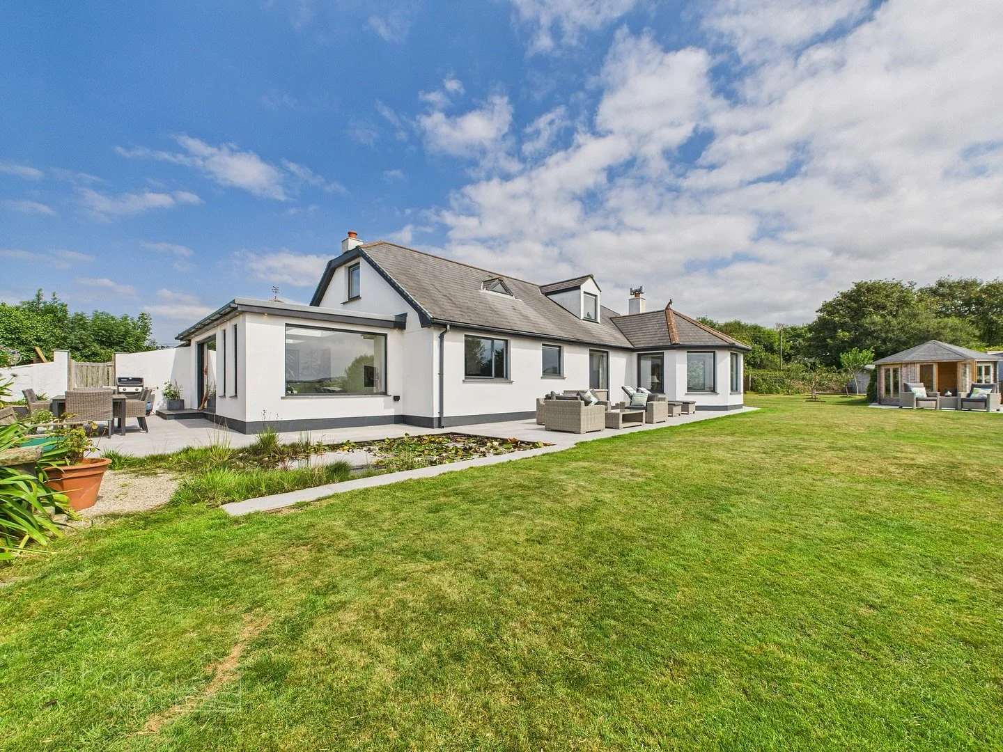 NEW LISTING ✨🌳

Wheal Rose | &pound;775,000

For the first time in 20 years, this exceptional home is available to the market!
Spanning over 250 sq meters and set within 1/3 an acre of stunning wrap-around gardens this four-bedroom detached residenc