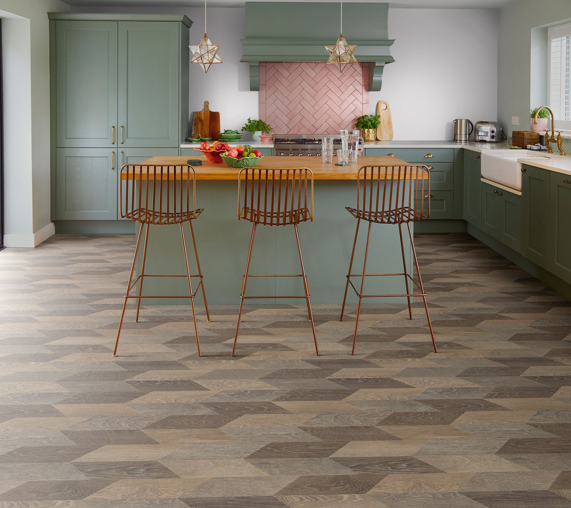 Beautiful herringbone pattern flooring in a new kitchen