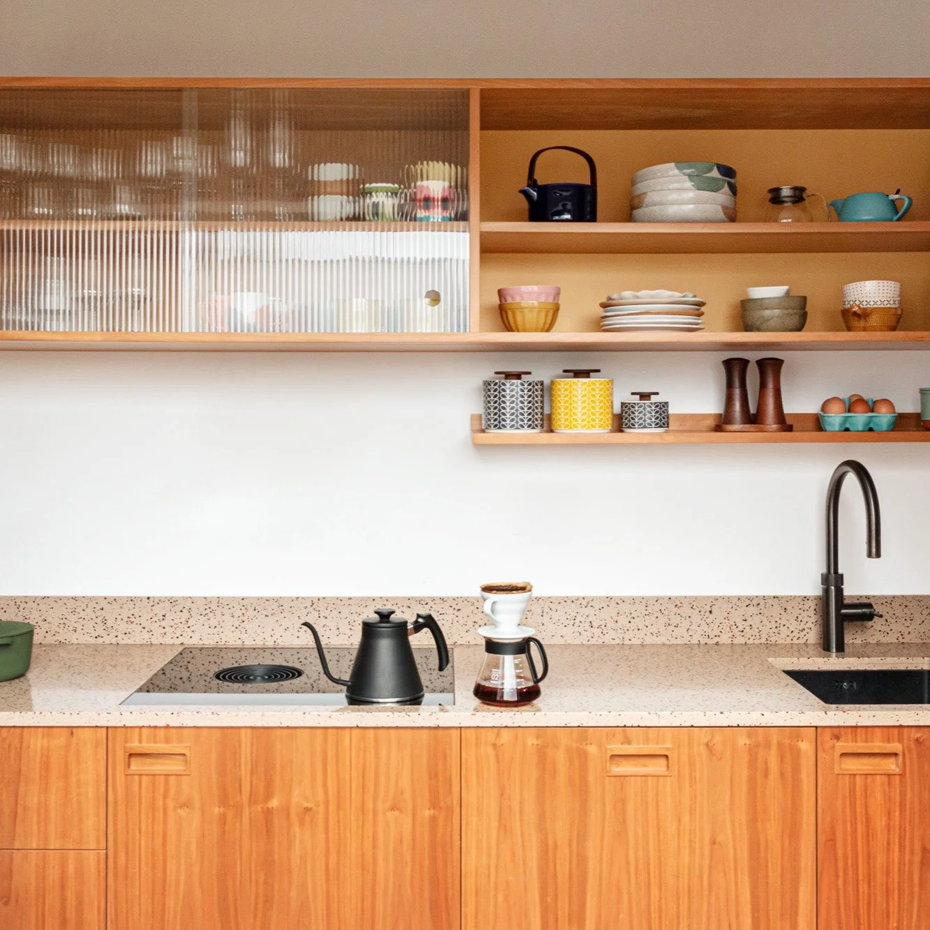 New project // Church Road

Cherry, Fenix, Durat and reeded glass pack a punch in this galley kitchen and dining room.