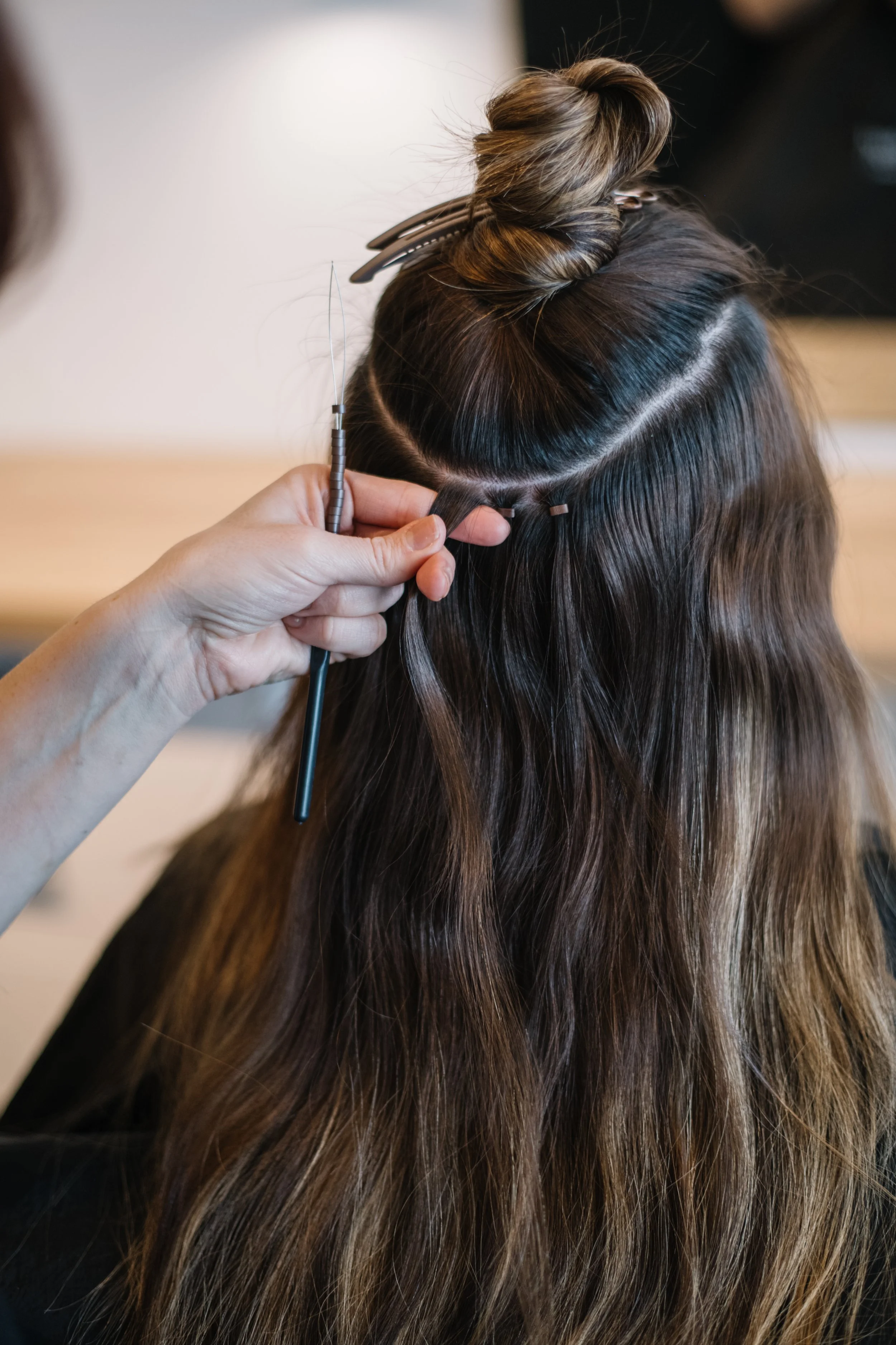 premium-weft-hair-extensions-below-hair-studio.jpg