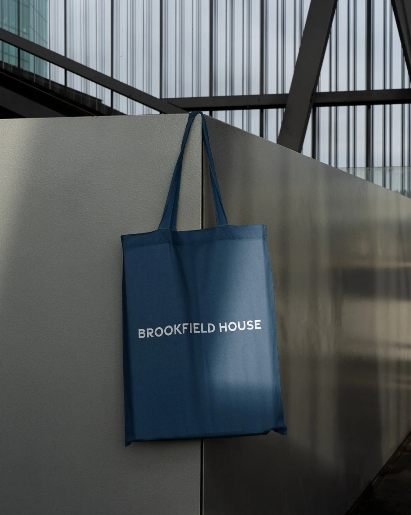 Carrying the identity into the experience.

We extended the brand into a curated set of materials that support the tenant experience and day-to-day touchpoints. Simple brand applications that reflect the same level of quality and restraint seen throu