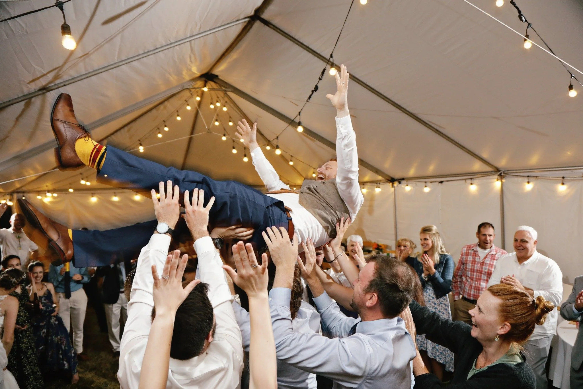 This Super Bowl Sunday, we think fondly of the boisterous celebrations that take place in our lives.  You should have heard the sounds coming from this wedding tent at Cascadia Meadows when the groom was thrown into the air by his nieces and nephews 