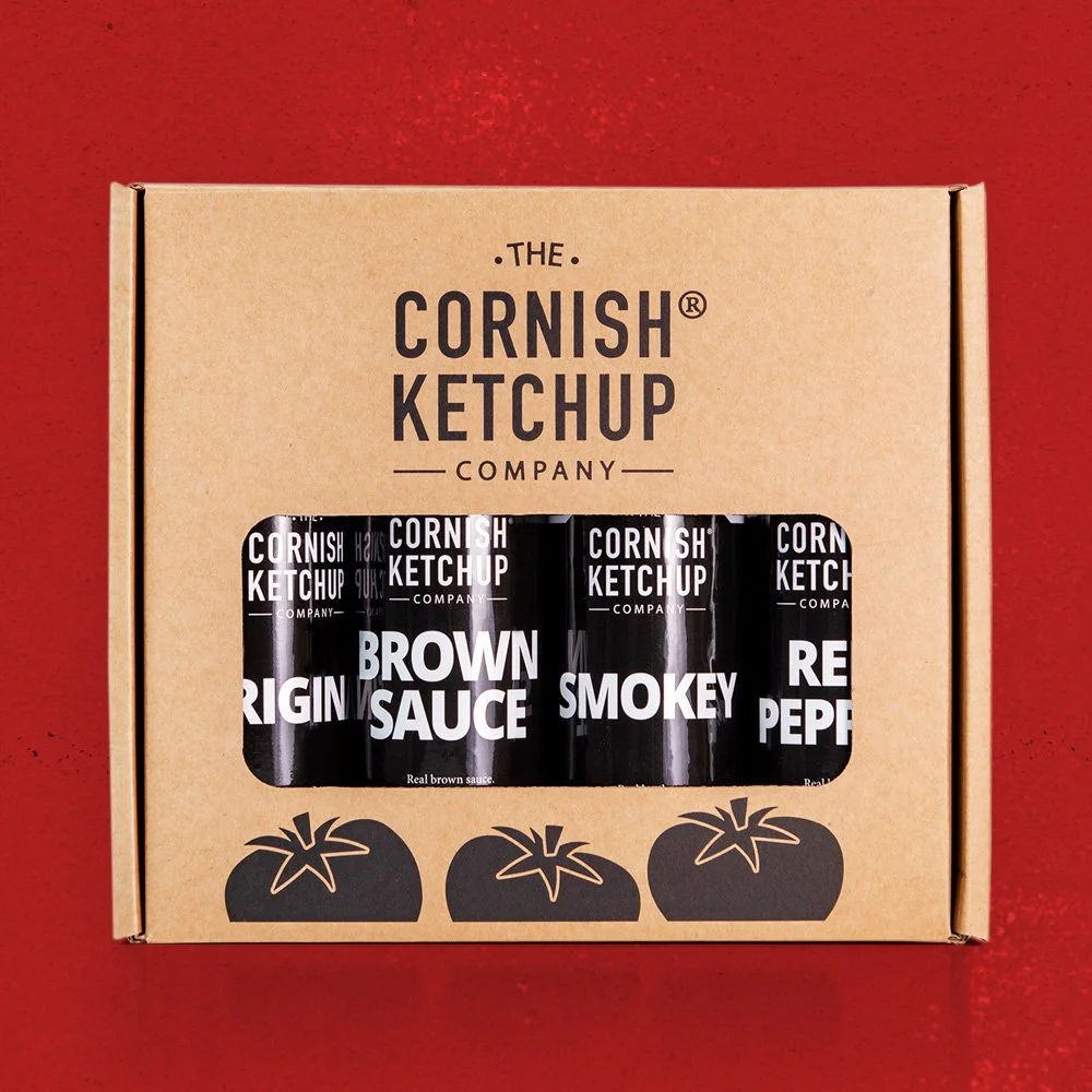 Gift box containing original ketchup, brown sauce, smokey ketchup and red pepper ketchup