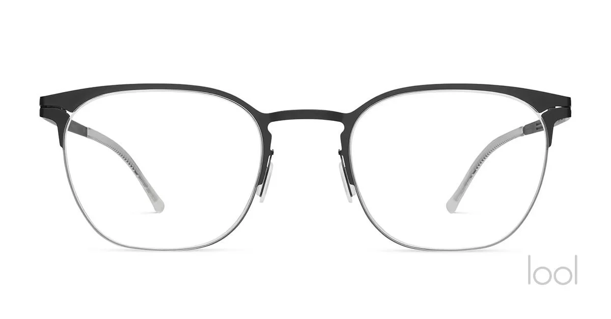 A pair of black and silver eyeglasses with a modern design on a white background.