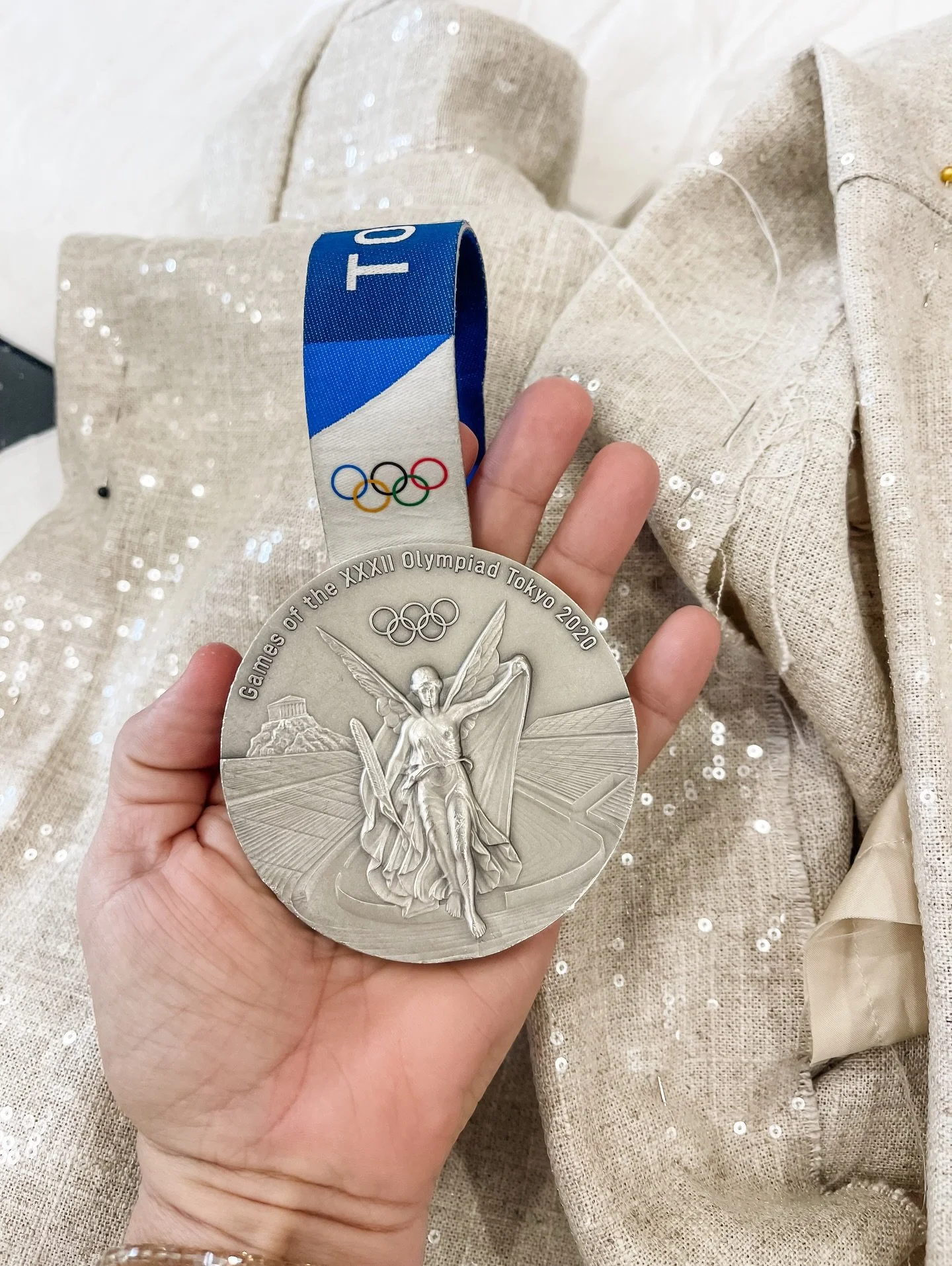 Last night, as I watched the opening ceremonies of the @olympics , my heart went straight back to last summer&mdash;when I designed my very first garment for an Olympian, @hayliemac8 . 🥹✨

Haylie and I are from the same hometown. Two girls with big 