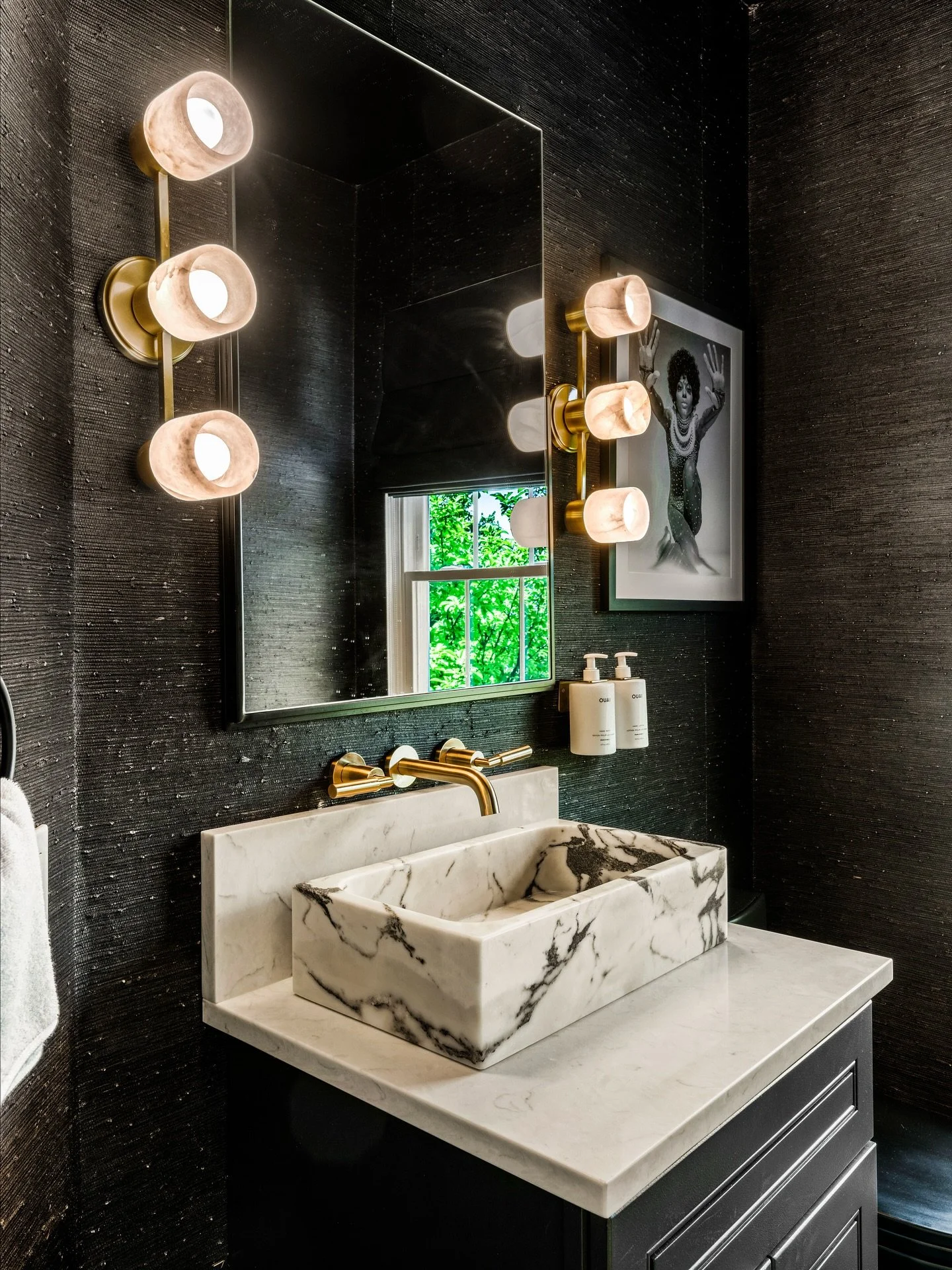 What can&rsquo;t a little Diana Ross portrait, Italian marble sink and black grass cloth solve? Don&rsquo;t worry, We&rsquo;ll wait?