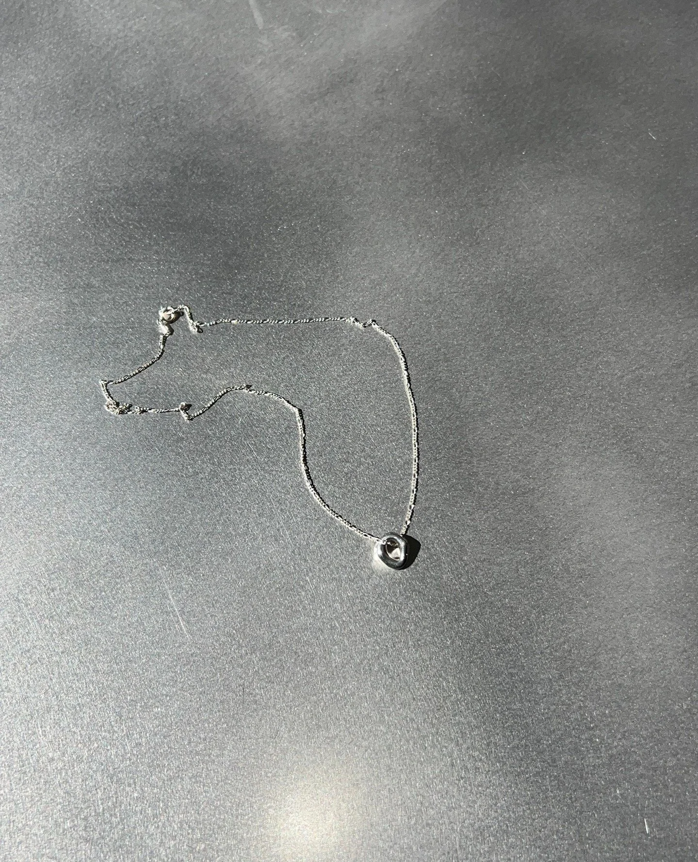 The Loop Necklace 2. Cast in 925 silver on a figaro chain.
