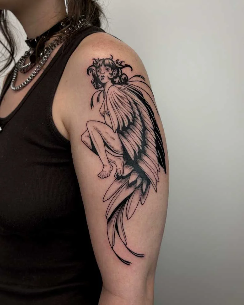 Surreal tattoo by Kuya (@kuya.tattoos) of a winged woman at Dark Water, Oakland and Berkeley's top-rated tattoo studio.