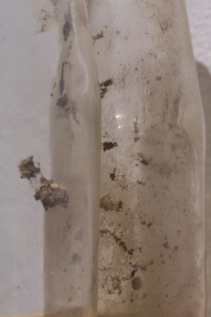 Pair of cream bottles c.1960