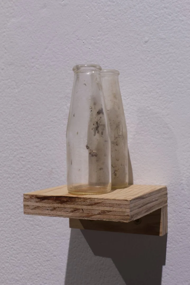 Pair of cream bottles c.1960