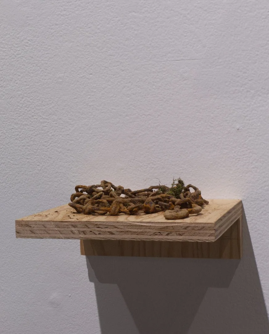 Rusted sign chain with hooks (sign frame missing but found on excavation) Date unknown 