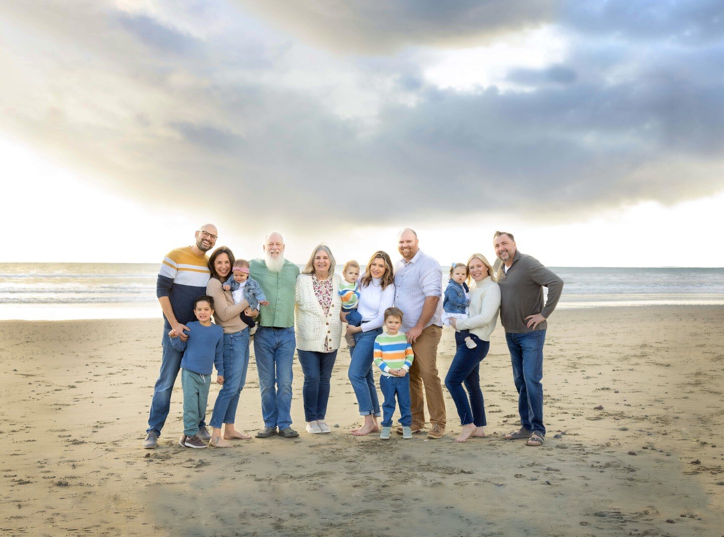 We have had some crazy weather on the California Central Coast this week, even snow. We snuck in this vacation family portrait right in between storms with rainfall on the horizon. Broken sky and rain family portrait in Cayucos, California. Is your f