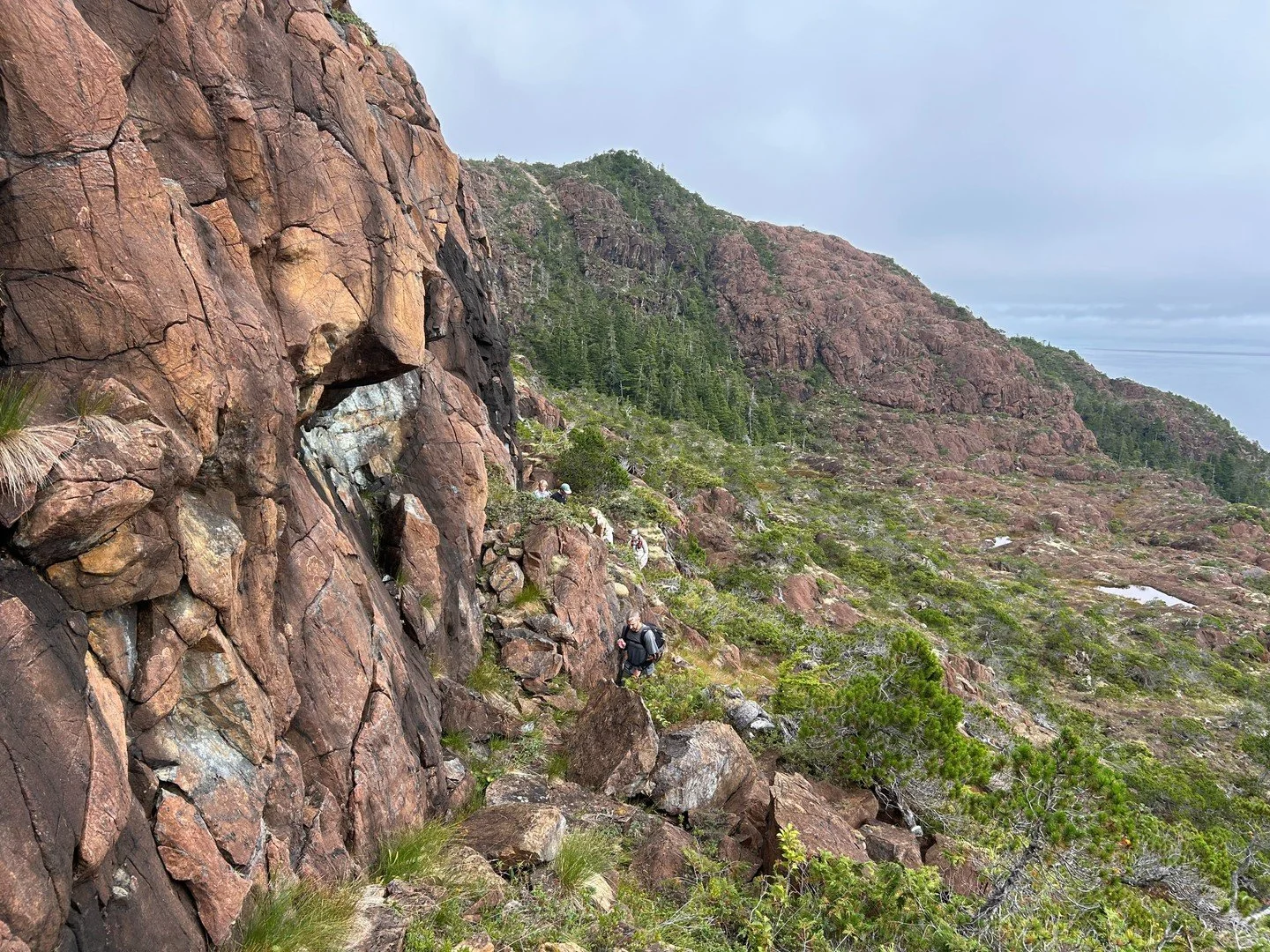 High above the water, red rock glows warm against a cool Alaskan sky. You can just make out a few of our guests&mdash;small against the expanse&mdash;hiking to the perfect vista to take it in.

Hikes like this are quiet and unhurried, meant for refle