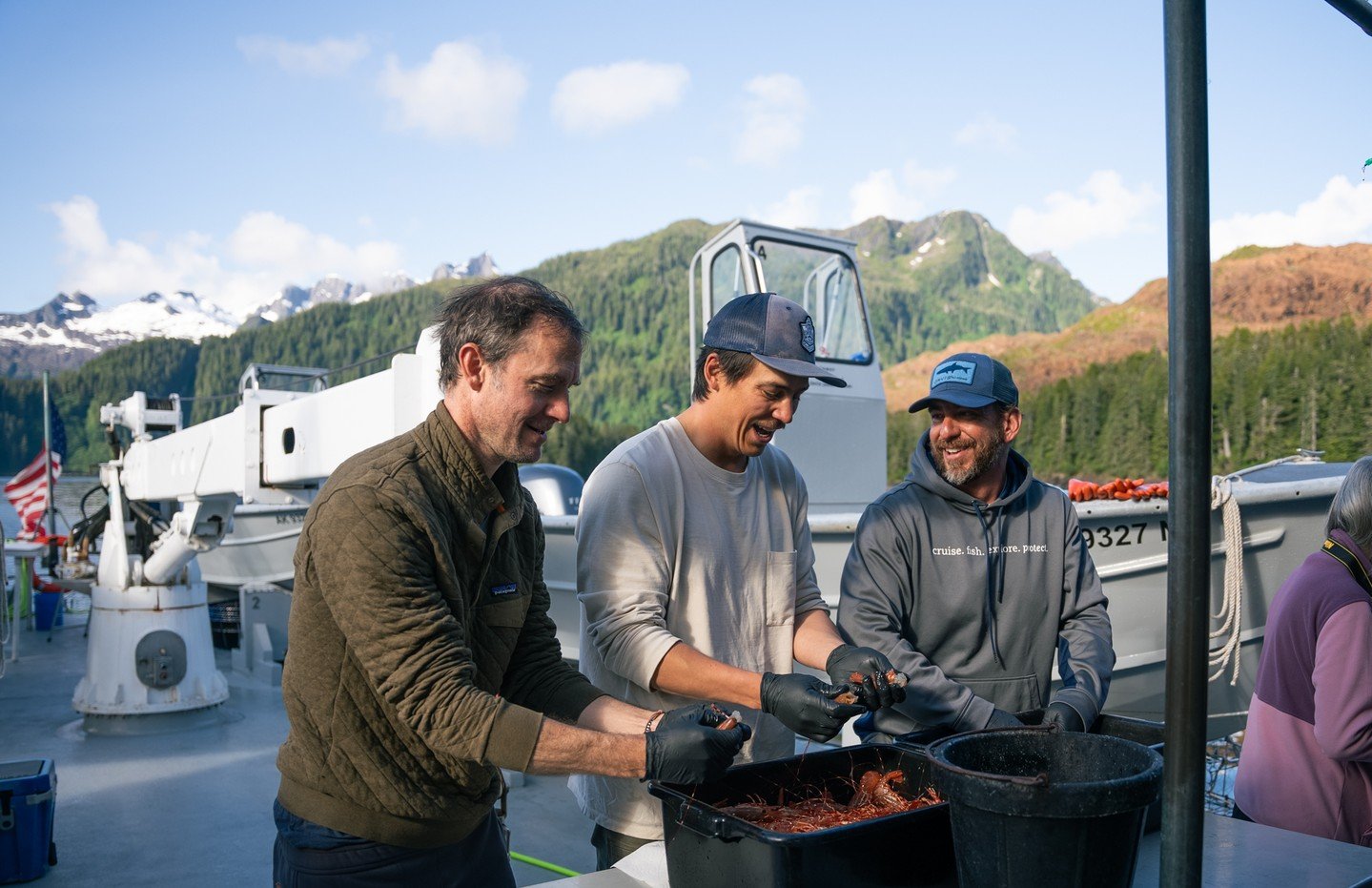 End of the day. Golden light. Three friends &mdash; crew and guests alike &mdash; working side by side, smiles easy, sleeves rolled up.

The pots come up glistening with fresh Alaska spot prawns, and there&rsquo;s laughter in the air &mdash; that eas