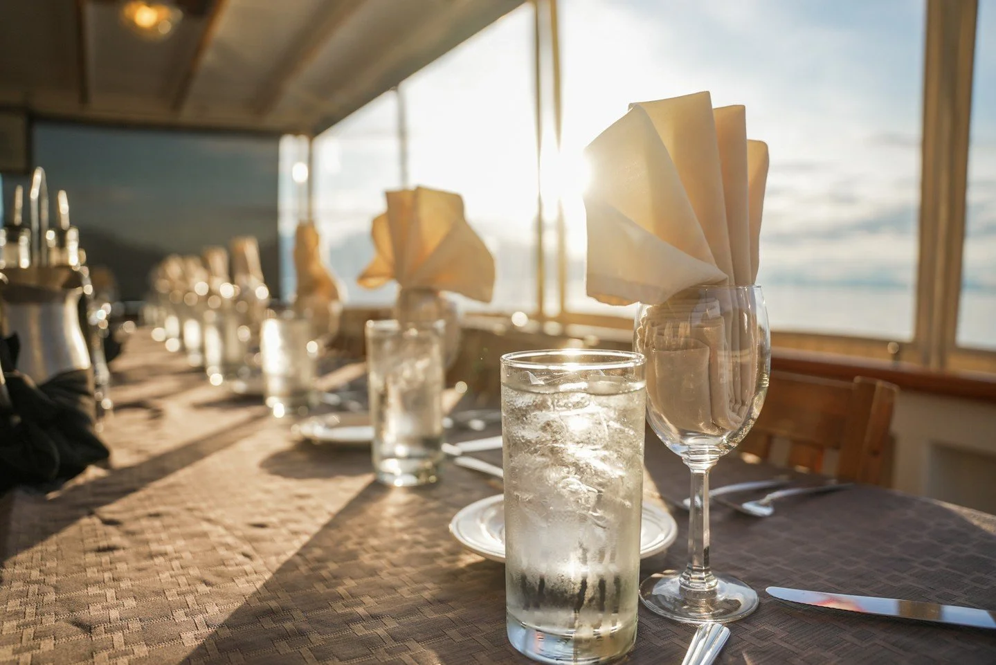 Evenings aboard are unhurried &mdash; light slanting through the windows, conversation lingering, and the quiet satisfaction of a day spent outdoors.

Meals here aren&rsquo;t about formality. They&rsquo;re about warmth, shared stories, and watching t