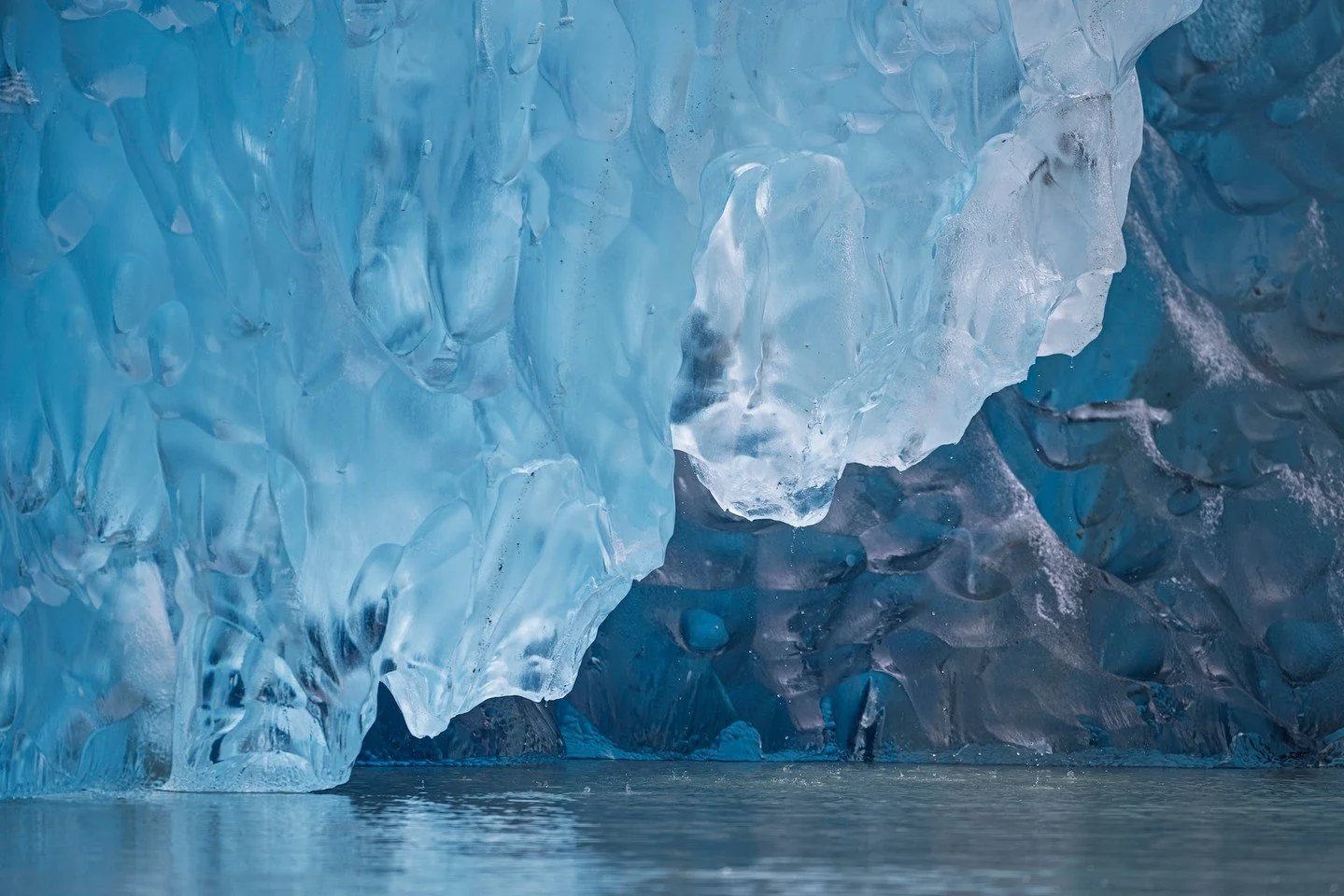 Up close, glaciers tell smaller stories &mdash; fractures, curves, and shades you&rsquo;d never notice from a distance. Sometimes, it&rsquo;s the details that stay with you longest.

🛥️ Cruise with us in 2026: theboatcompany.org

[Alt Text: Close-up