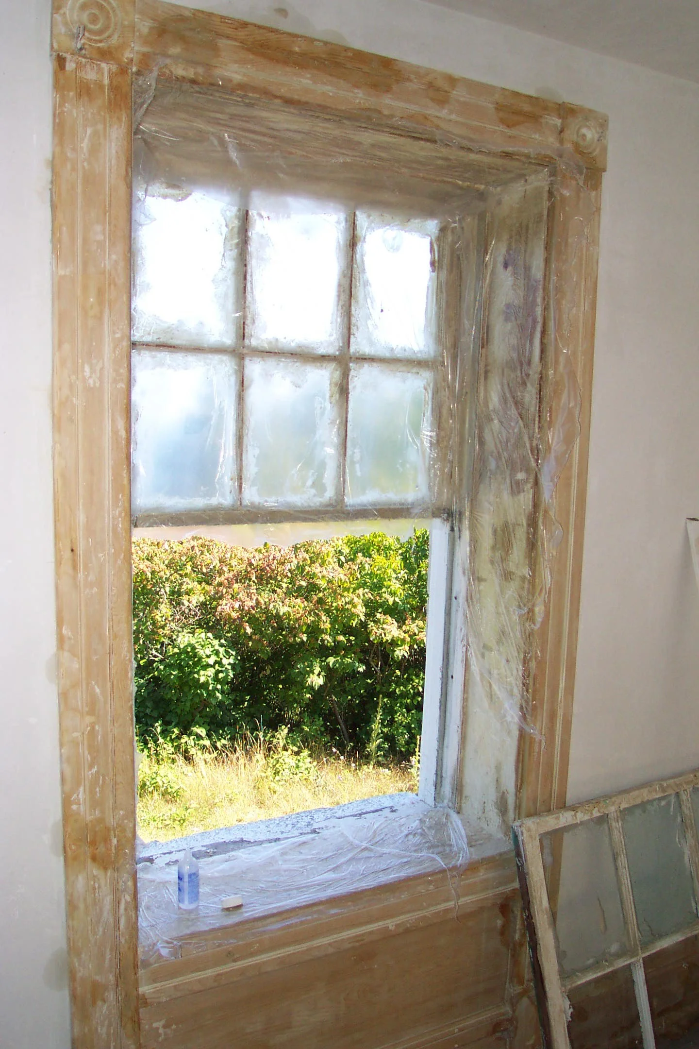 PottawatomieLighthouseRestoration2003North Stairway Window.JPG