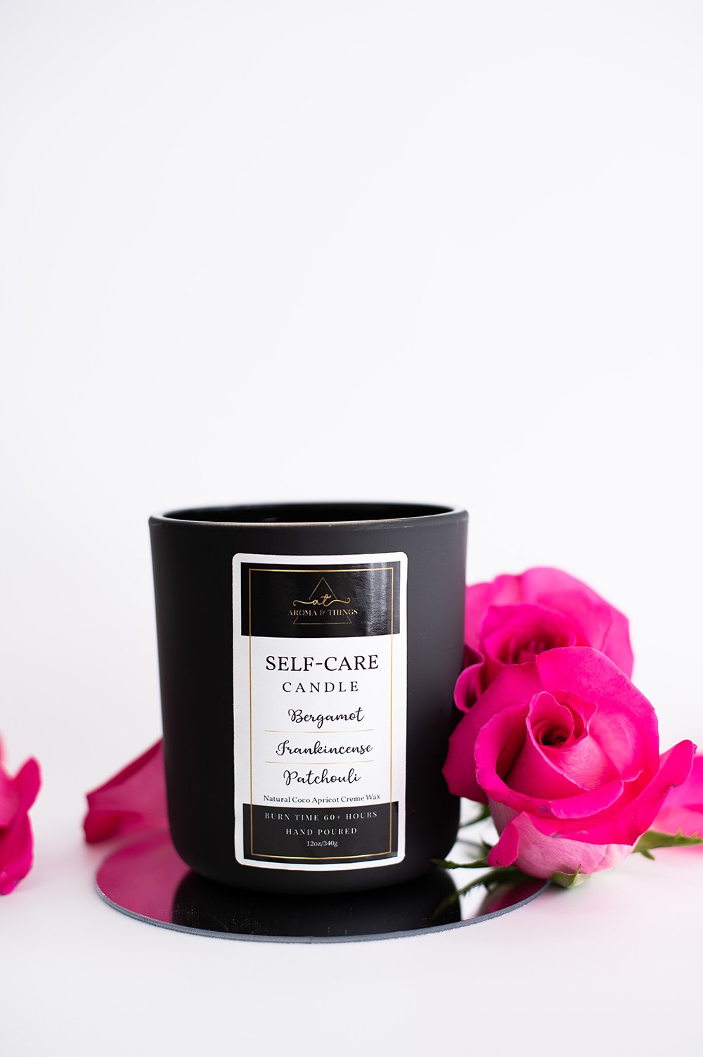 Self care candle - bergamot, frankincense, patchouli; black jar, pink roses 