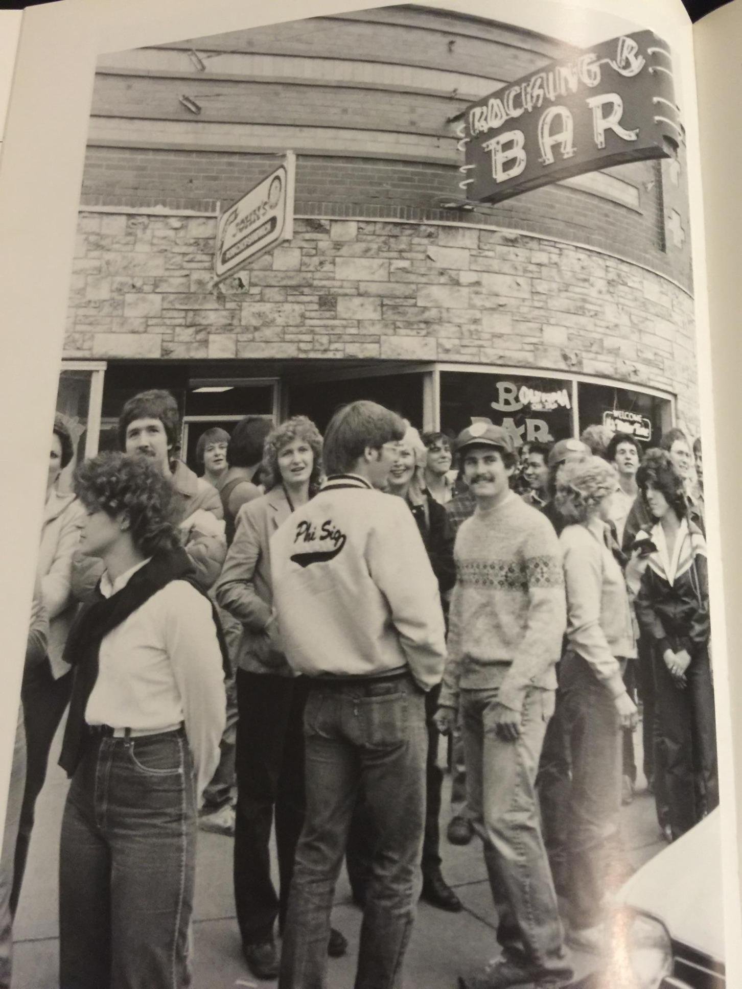 Vintage Photo of a crowd of people standing outside the front of the Rocking R Bar