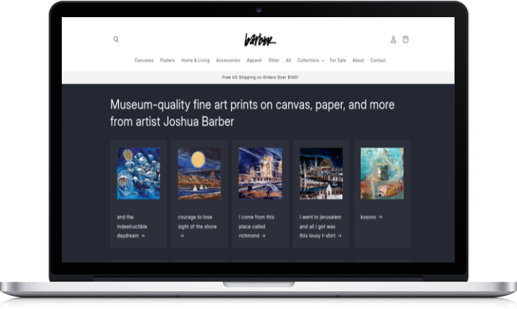 Laptop displaying an online art store with paintings by Joshua Barber, featuring artworks of a moonlit scene, a cityscape, and abstract compositions.