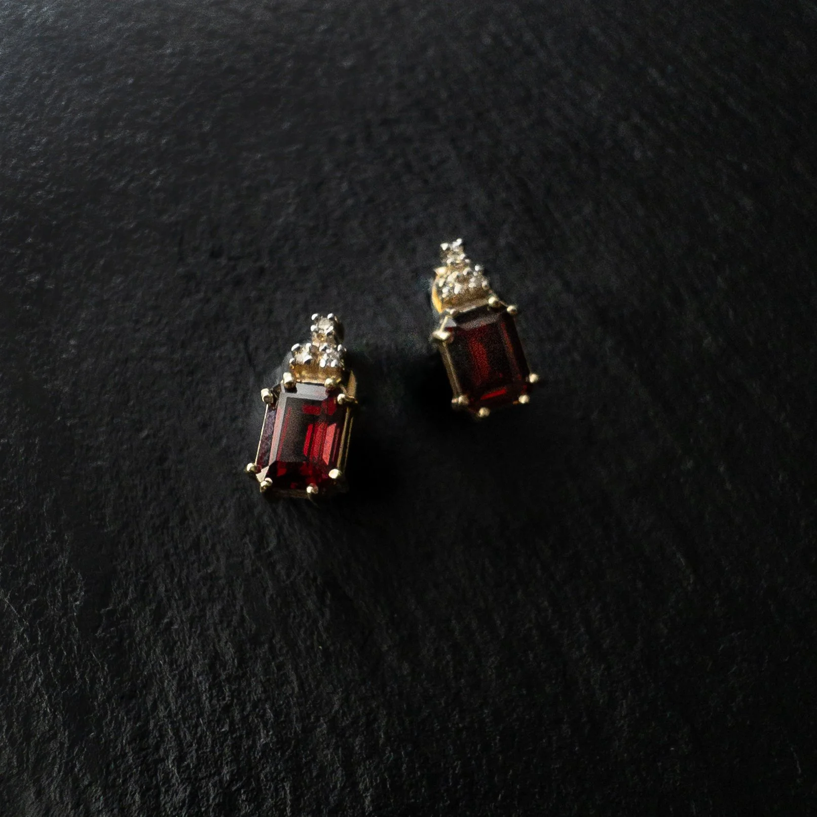 EMERALD CUT GARNET AND DIAMOND STUDS - 14KYG