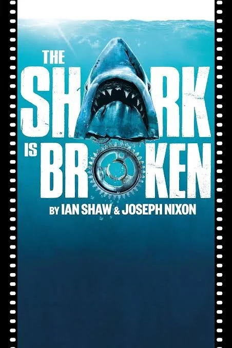 Book cover titled "The Shark is Broken" by Ian Shaw & Joseph Nixon, featuring a large shark with its mouth open beneath water, with part of the title submerged.