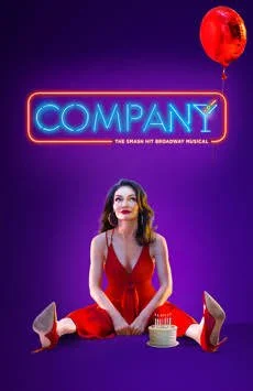 A woman in a red dress sitting on the floor with a birthday cake in front of her, purple background, neon sign that says 'COMPANY', red balloon floating above.