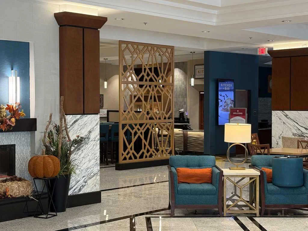 Architectural Panels That Define a Space Without Closing It In