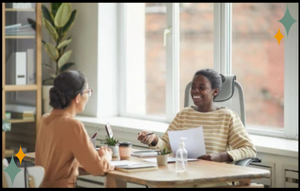 Therapist and client sitting together in a calm therapy space, representing collaborative trauma treatment