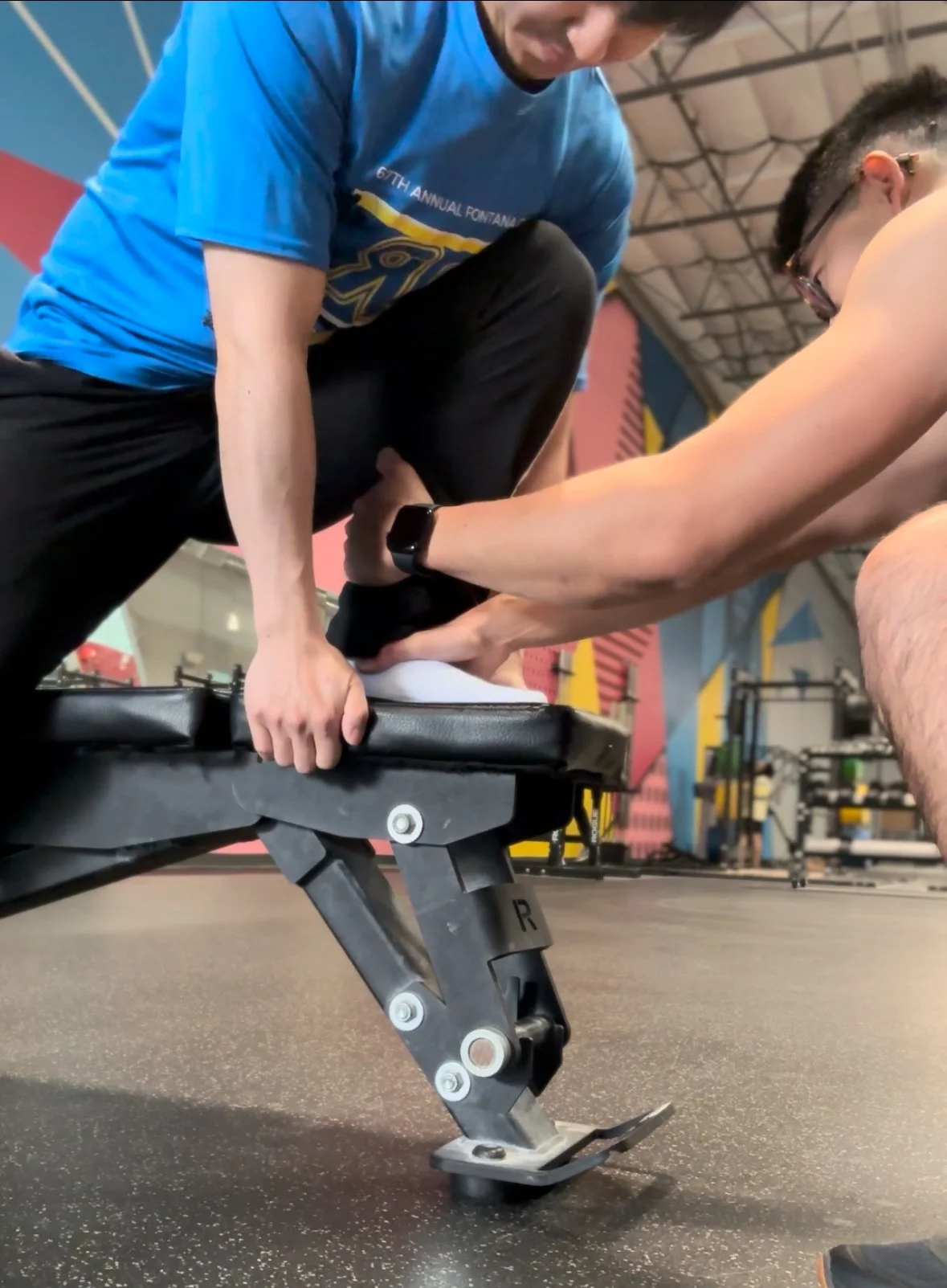 Mulligan mobilization San Diego, mobilization with movement San Diego, manual therapy San Diego, joint mobilization physical therapy San Diego. Physical therapist applying mobilization with movement in chronic ankle sprain stiffness squat mobility