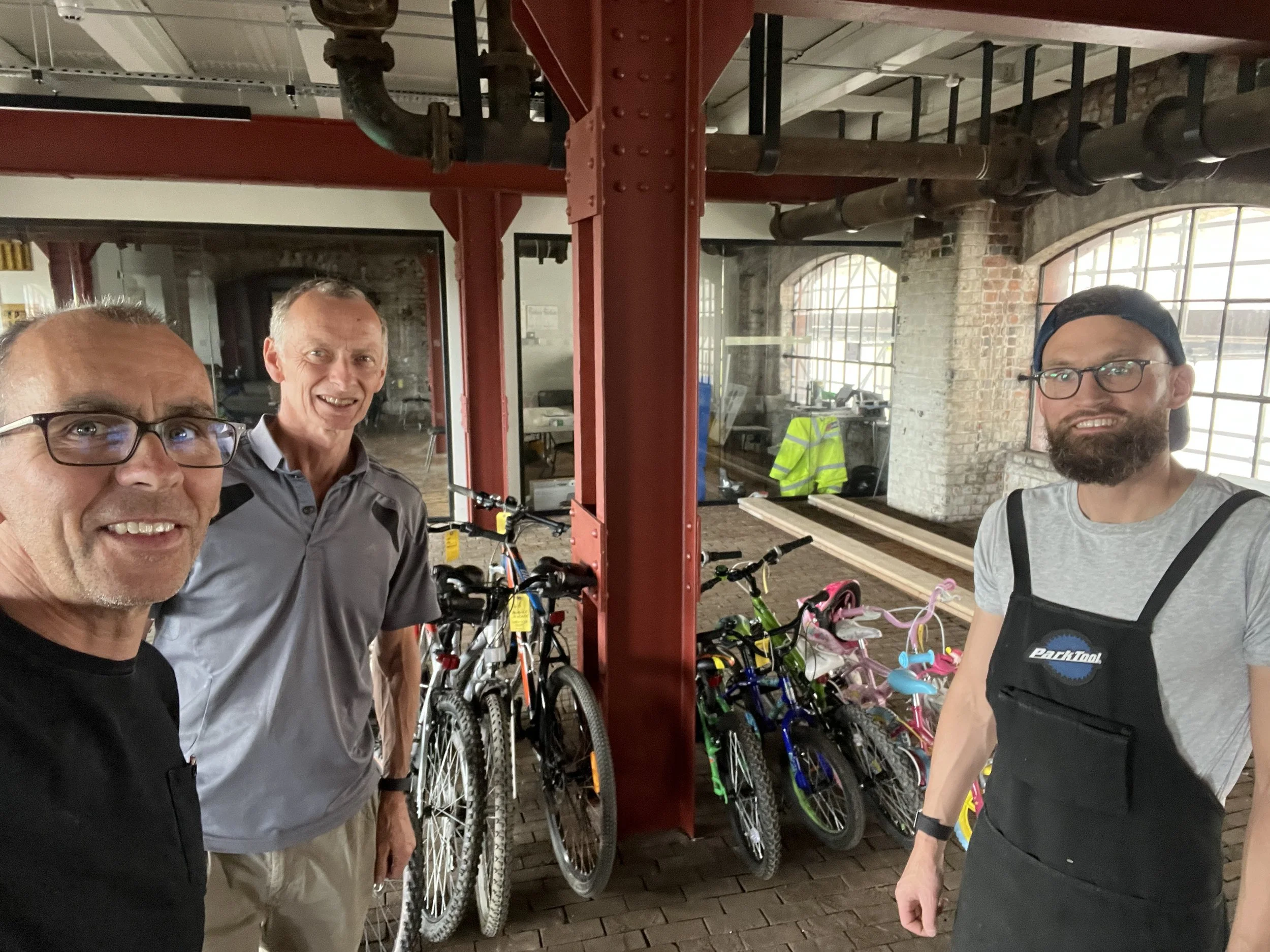 Dave, Gavin and Joe with 10 bikes serviced.