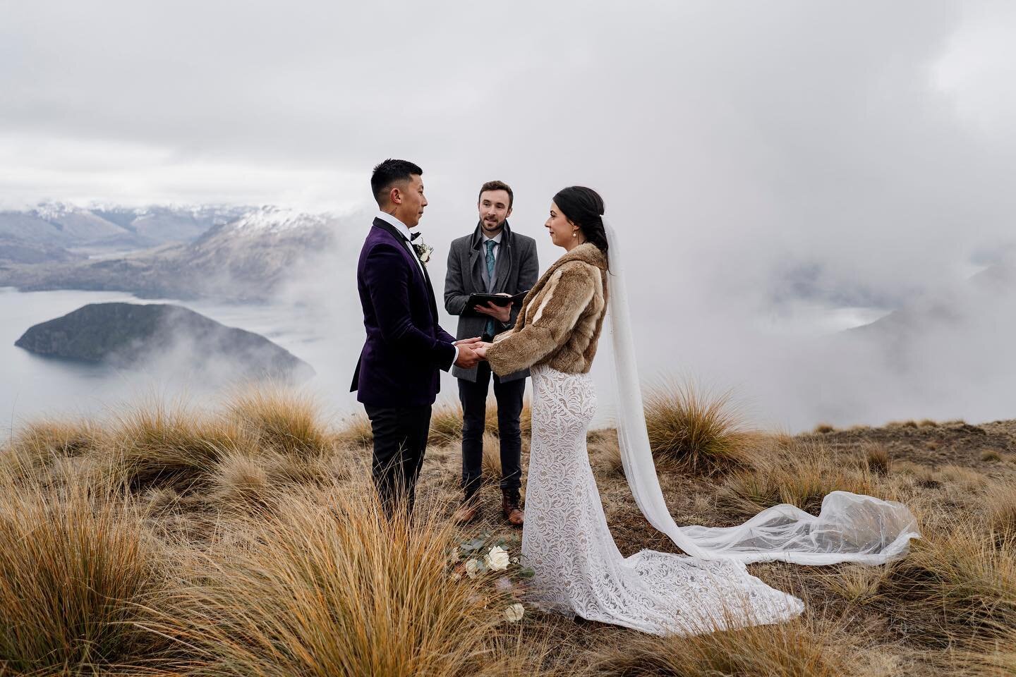 Among the swirling clouds on Wānaka Peninsula with Alyssa &amp; Pete 🖤

@hollywallacephotosfilms 
@andybrown 
@wanakahelicopters 

&bull;
&bull;
&bull;

#elopementgoals #celebratelove #destinationwedding #nzelopement #nzwedding #queenstownwedding #e