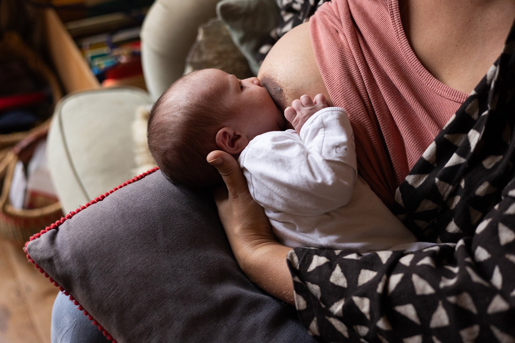Holding-baby-breasfeeding-photography-Nina Raingold.jpg