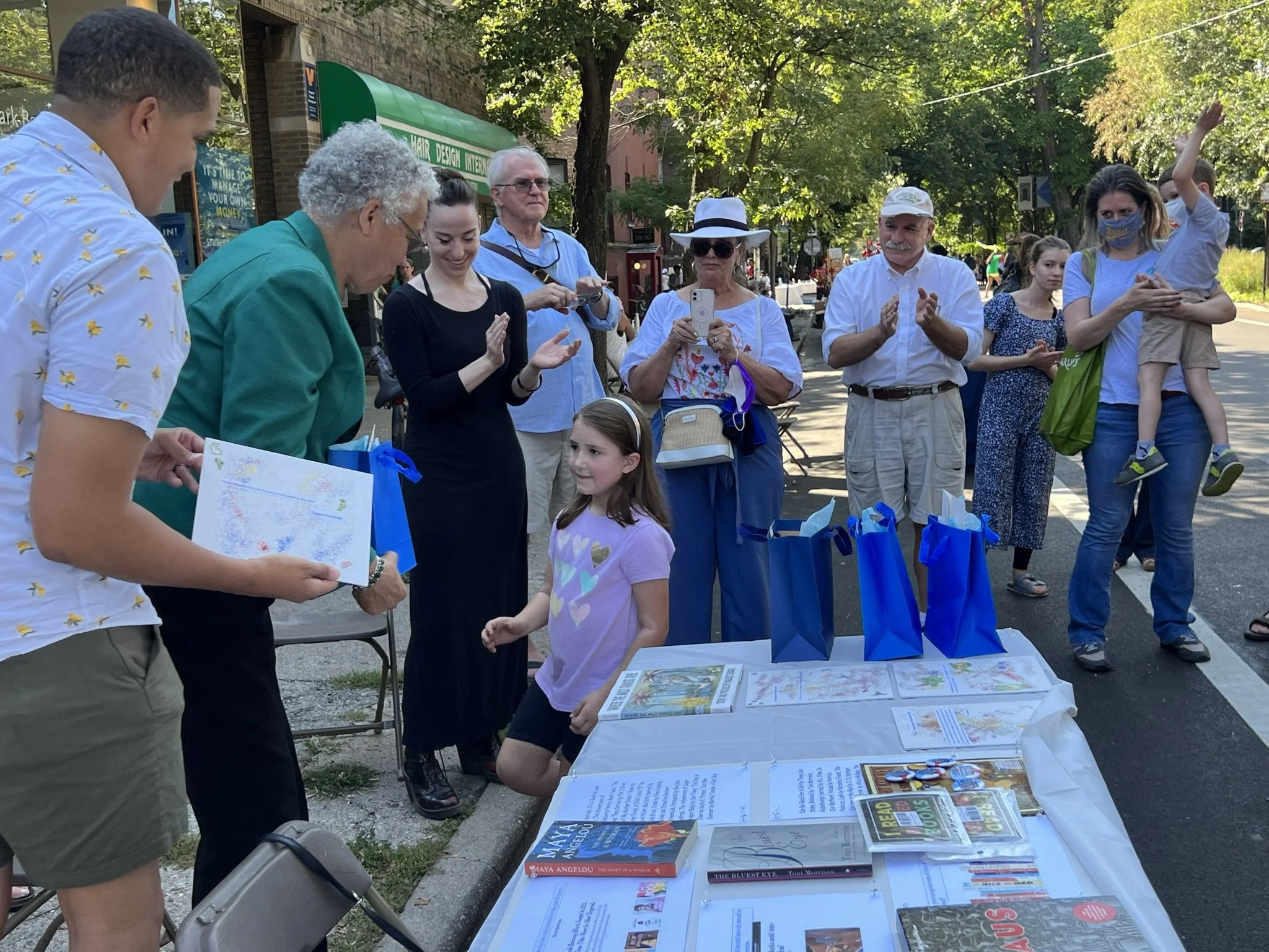 State Senator Robert Peters and Cook County Board President Toni Preckwinkle hand out awards to winners of the Banned Books Essay contest
