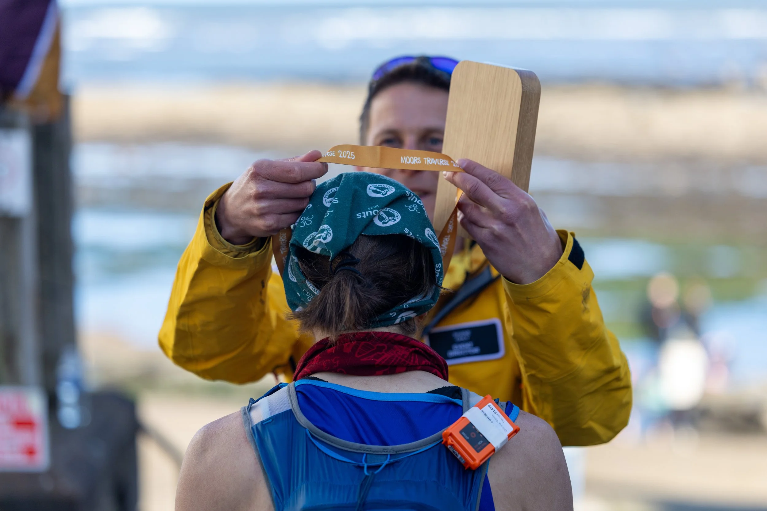 First Moors Traverse woman being awarded her medal 
