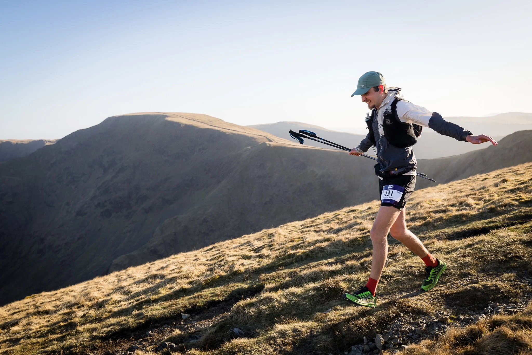 Man running freely downhill