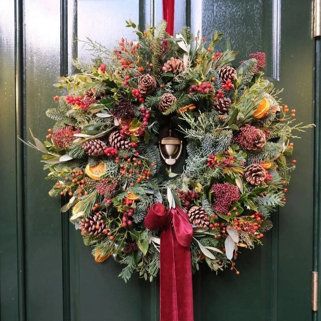 luxe-christmas-door-wreath-with-pine-cones-available-for-local-delivery-in-bloom-studio-florist.jpg