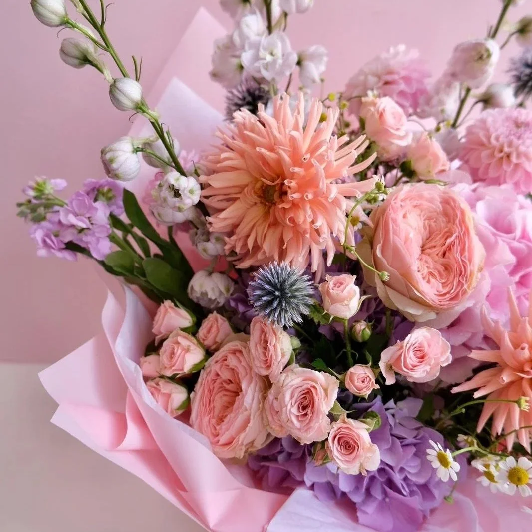 memories-of-marchmont-flower-bouquet-with-dahlias-and-hydrangea-wrapped-in-pink-packaging-in-bloom-studio-fresh-flowers.jpg
