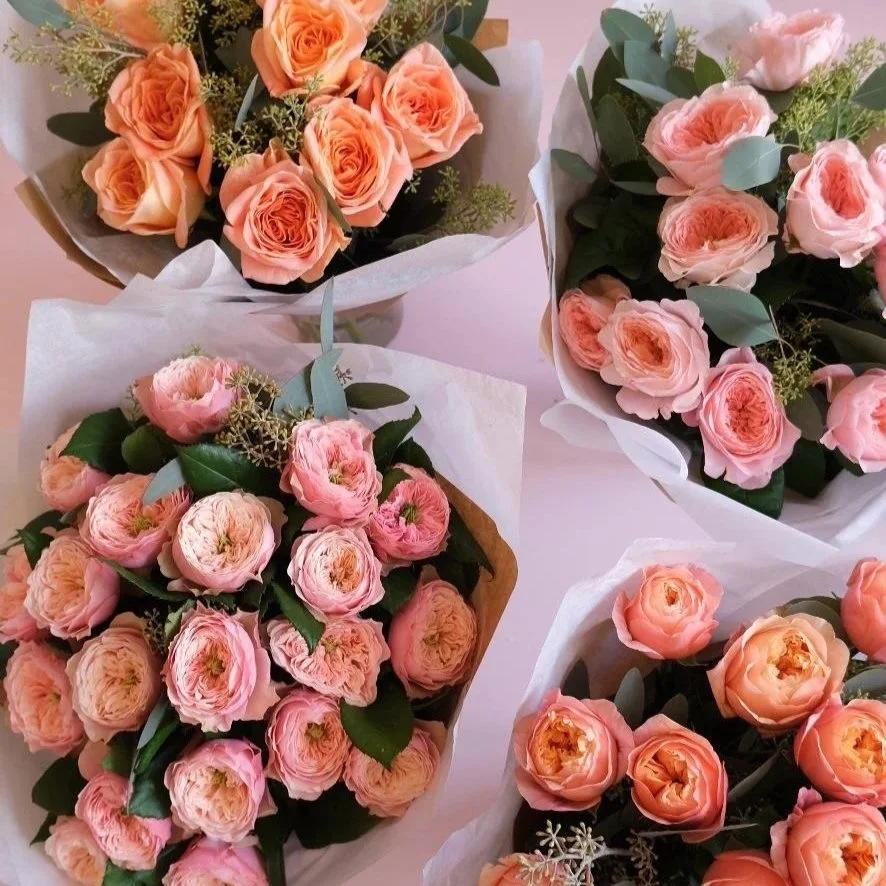 garden-rose-wraps-bouquet-available-for-delivery-and-collection-wrapped-in-brown-paper-and-tissue.jpg
