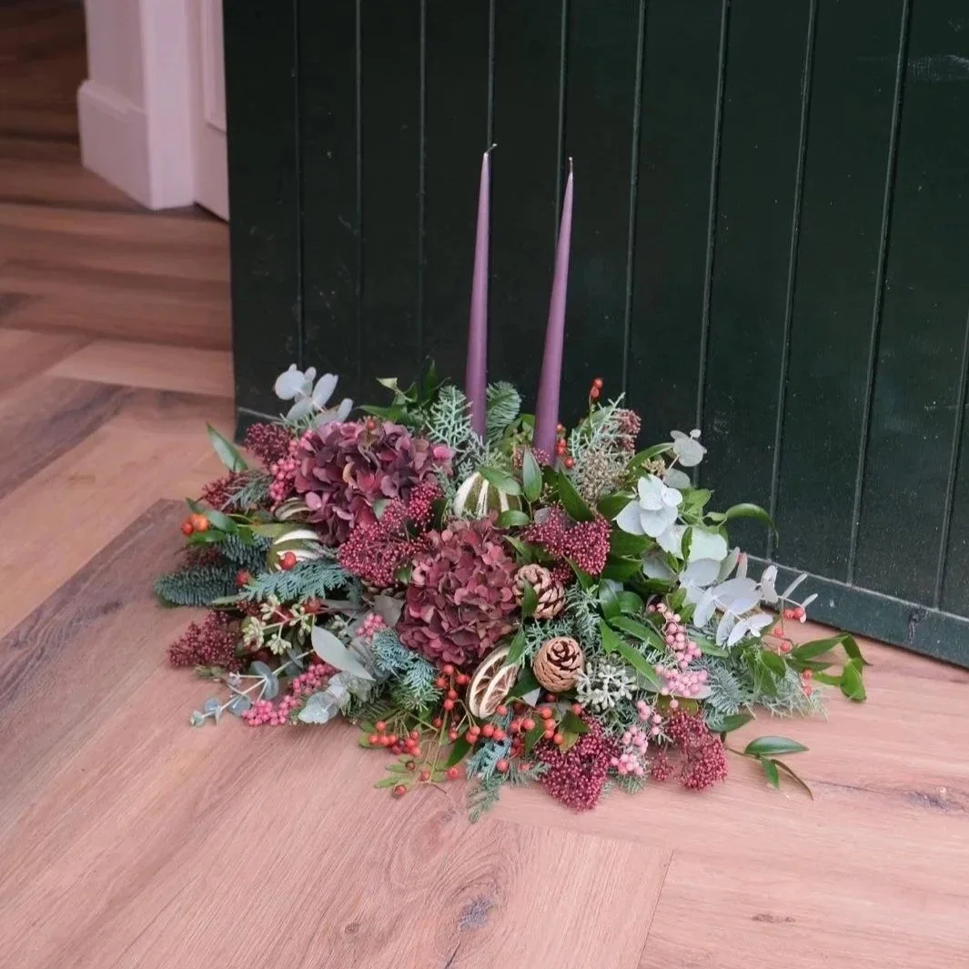 yuletide-christmas-table-arrangement-with-candles-hydrangeas-and-berries-in-bloom-flower-delivery-east-lothian-and-edinburgh.jpg