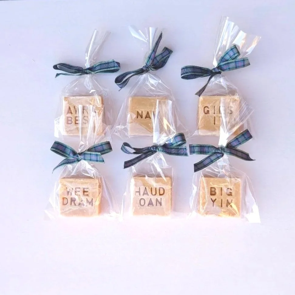 scottish-tablet-with-scottish-slang-words-wrapped-in-little-bags-tied-with-tartan.jpg